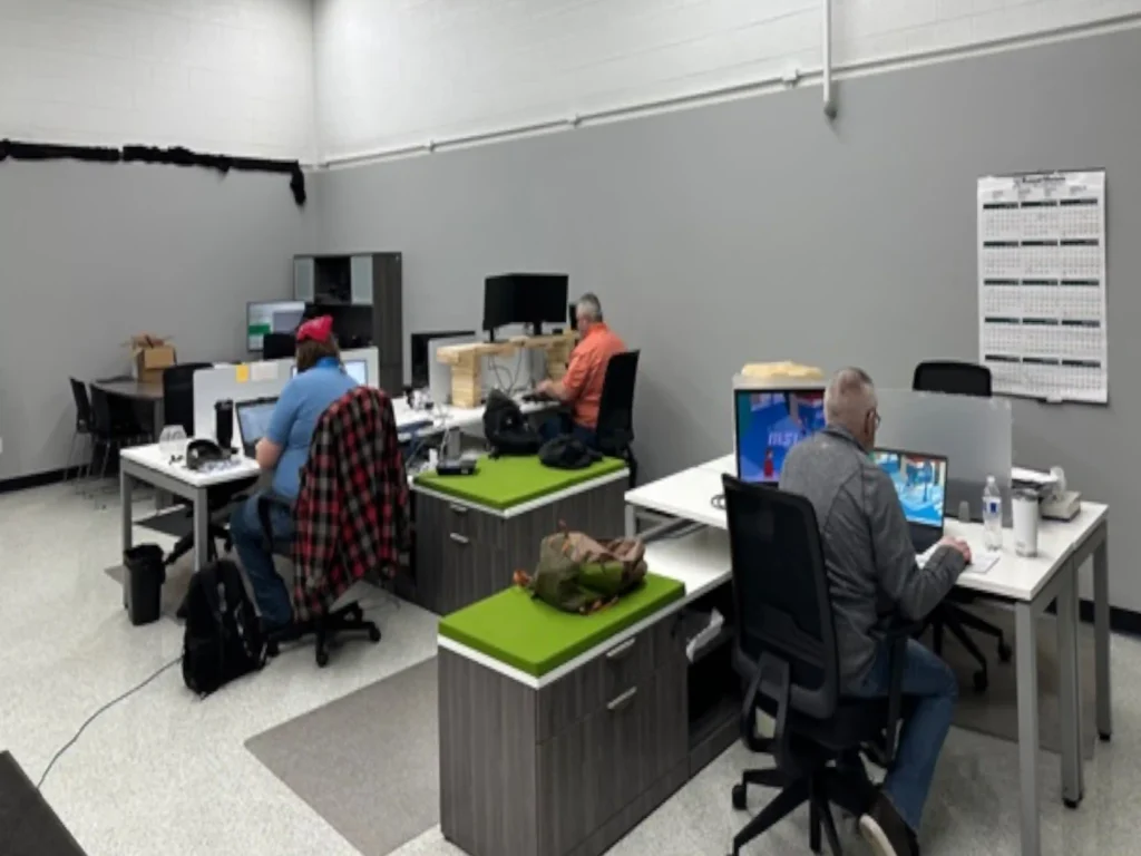 Project management team working at their desks.